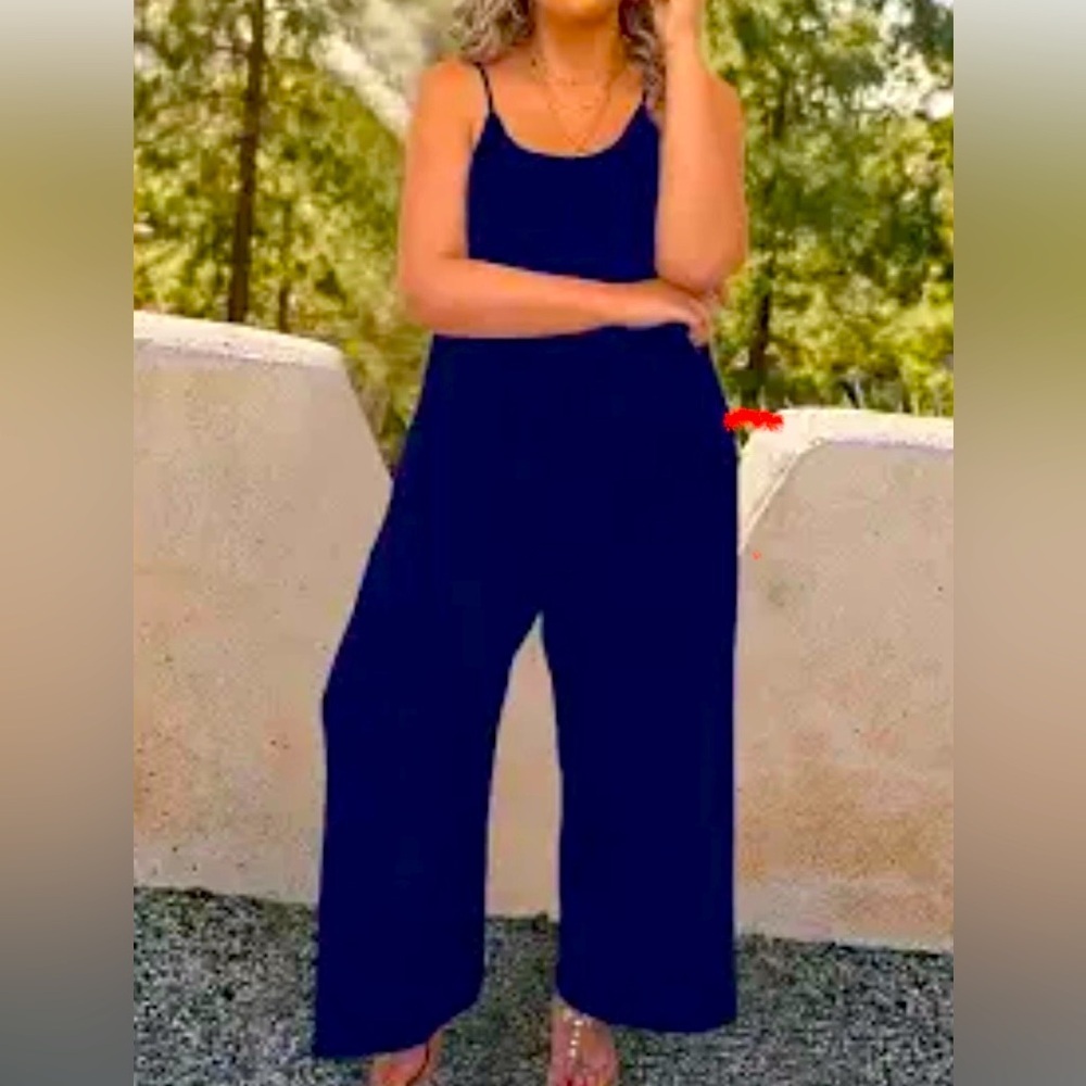 Brand: Forever 21, a jumpsuit, Navy blue, size M, 100% polyester.